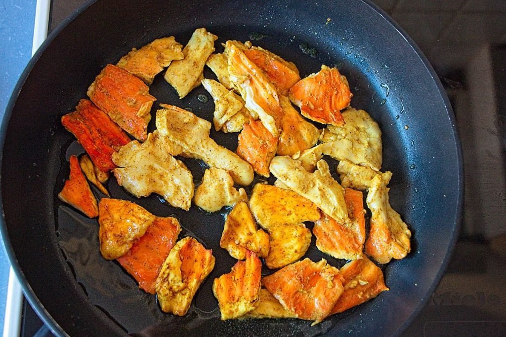 Grilled chicken of the woods mushrooms in a pan for butter chicken curry