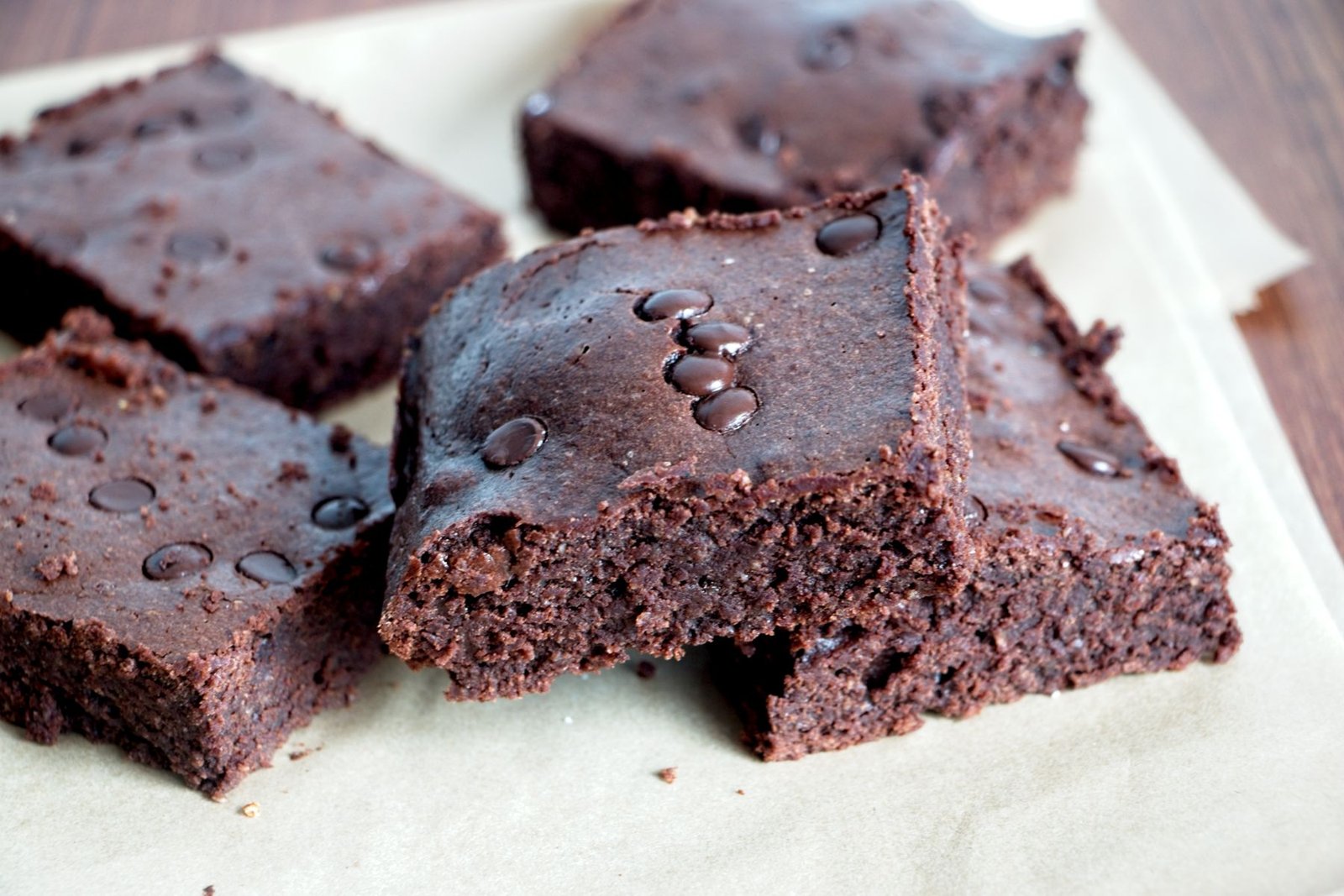 Fudgy protein brownies cut into thick squares with a dense chocolate centre.