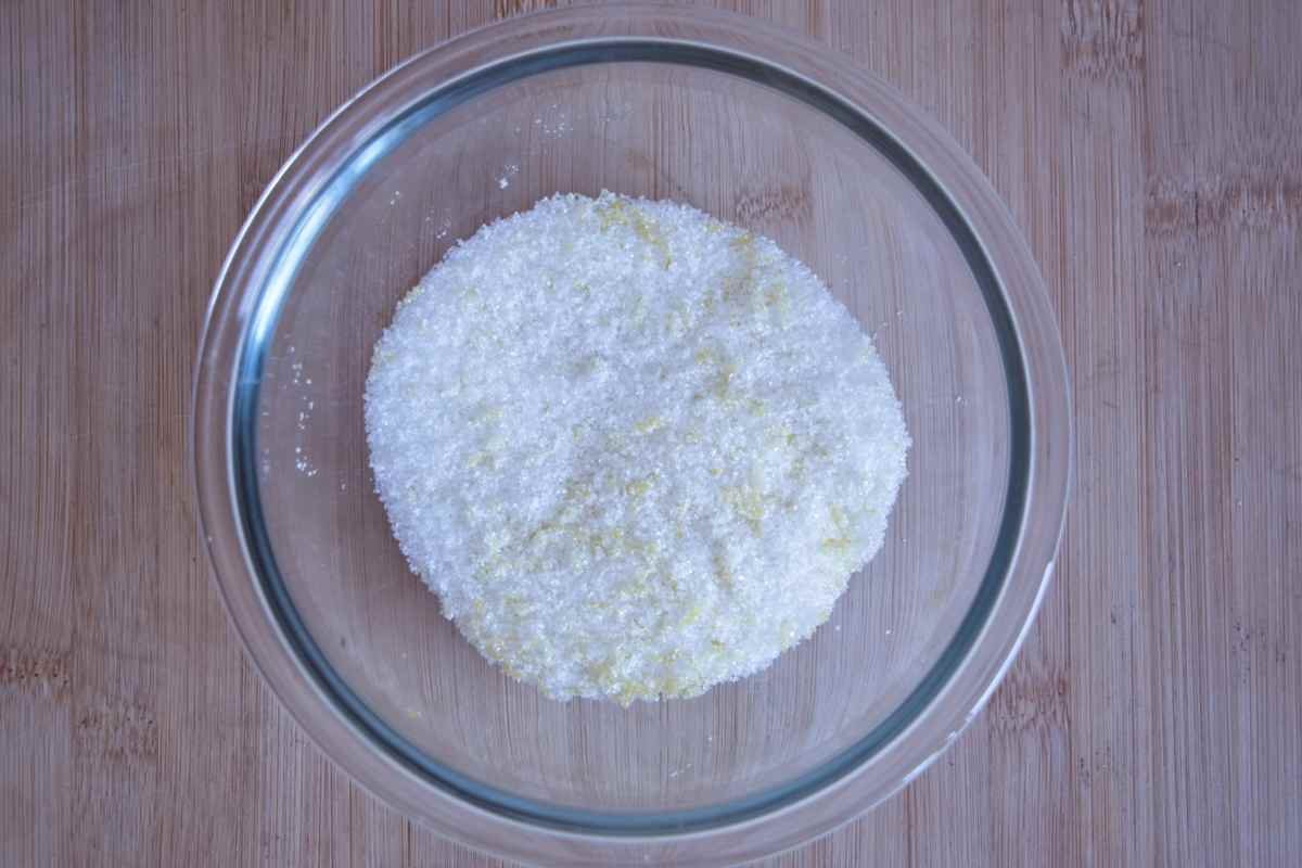 lemon zest rubbed into sugar to release citrus oils for cake batter