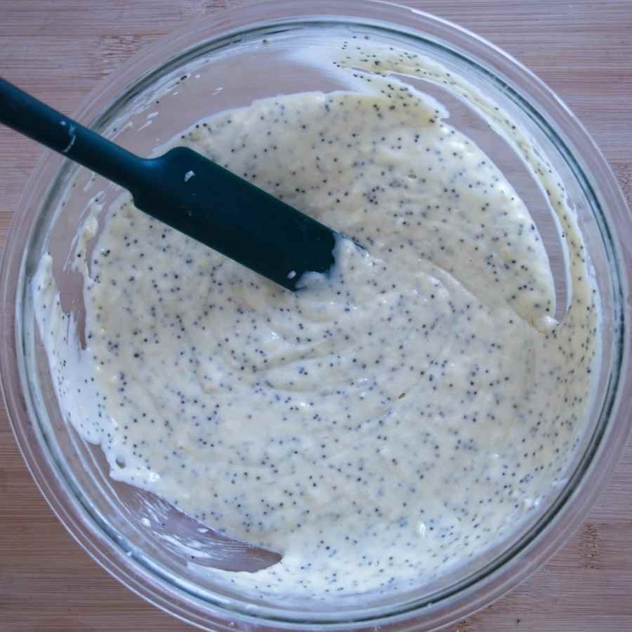 poppy seed cake batter mixed and ready to pour into a loaf tin