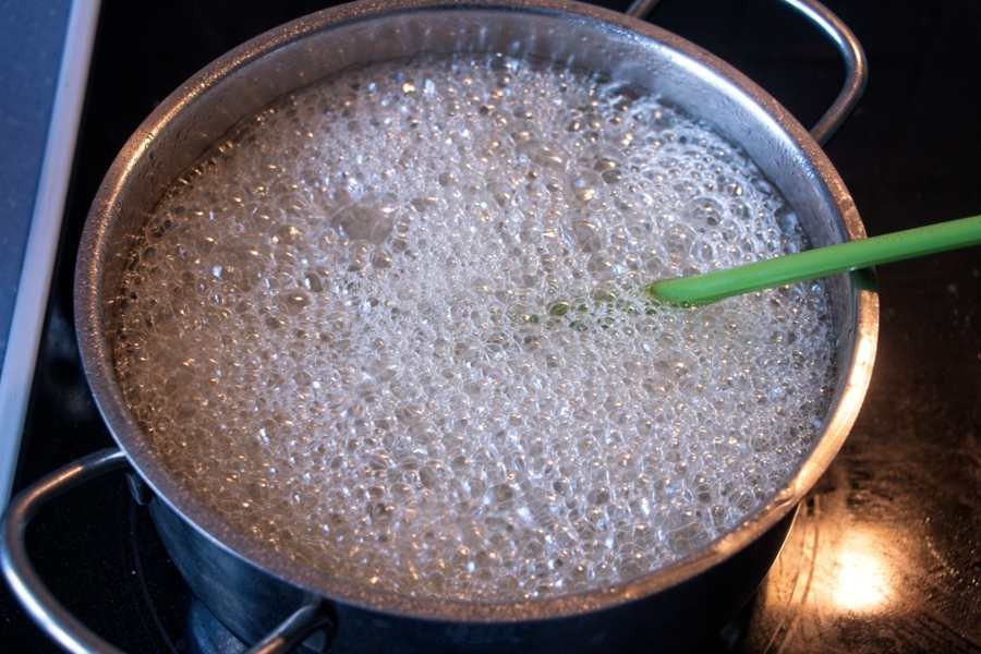 syrup boiling rapidly in saucepan