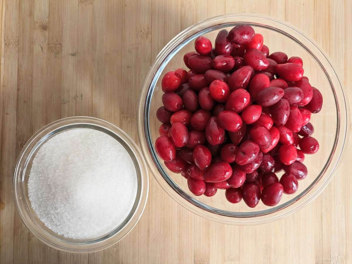 Cornelian cherries and granulated sugar ready for making jam.